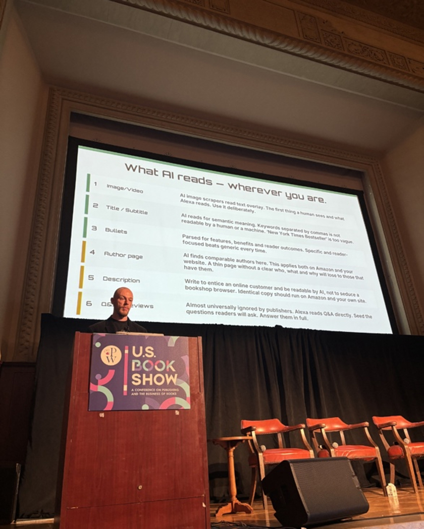 Speaker presenting a slide about what AI reads at the U.S. Book Show