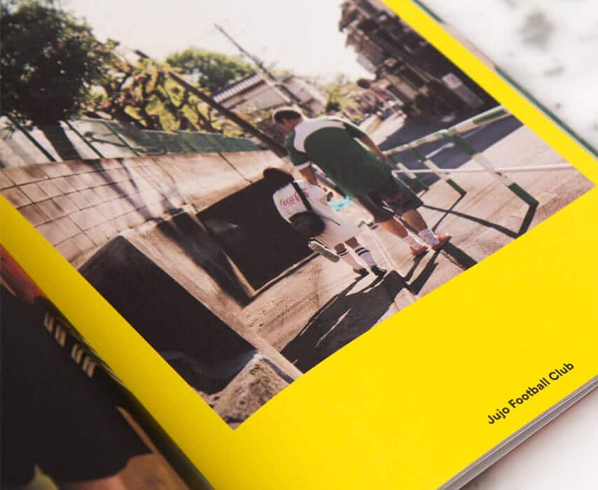 photo of man walking in street