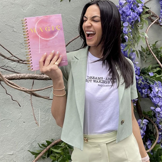 Natalee holding Magic Journal in hand